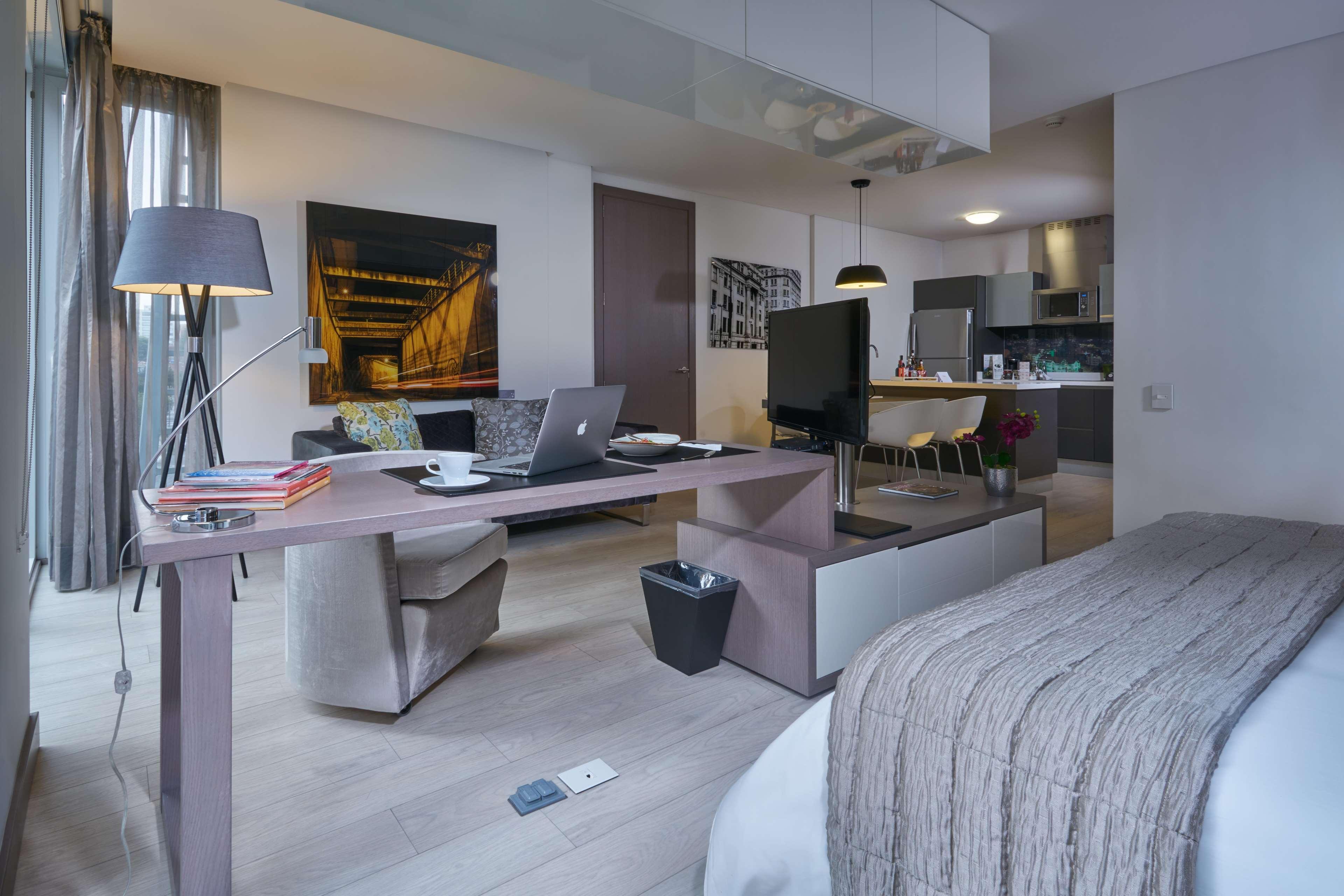 Hotel 100 Luxury Suites By Preferred Bogotá Exterior foto A typical studio apartment