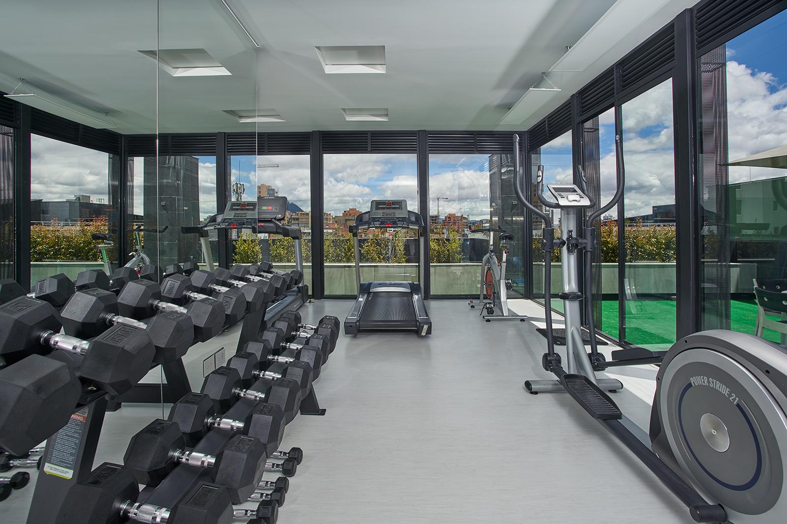 Hotel 100 Luxury Suites By Preferred Bogotá Exterior foto The gym at the top of the building