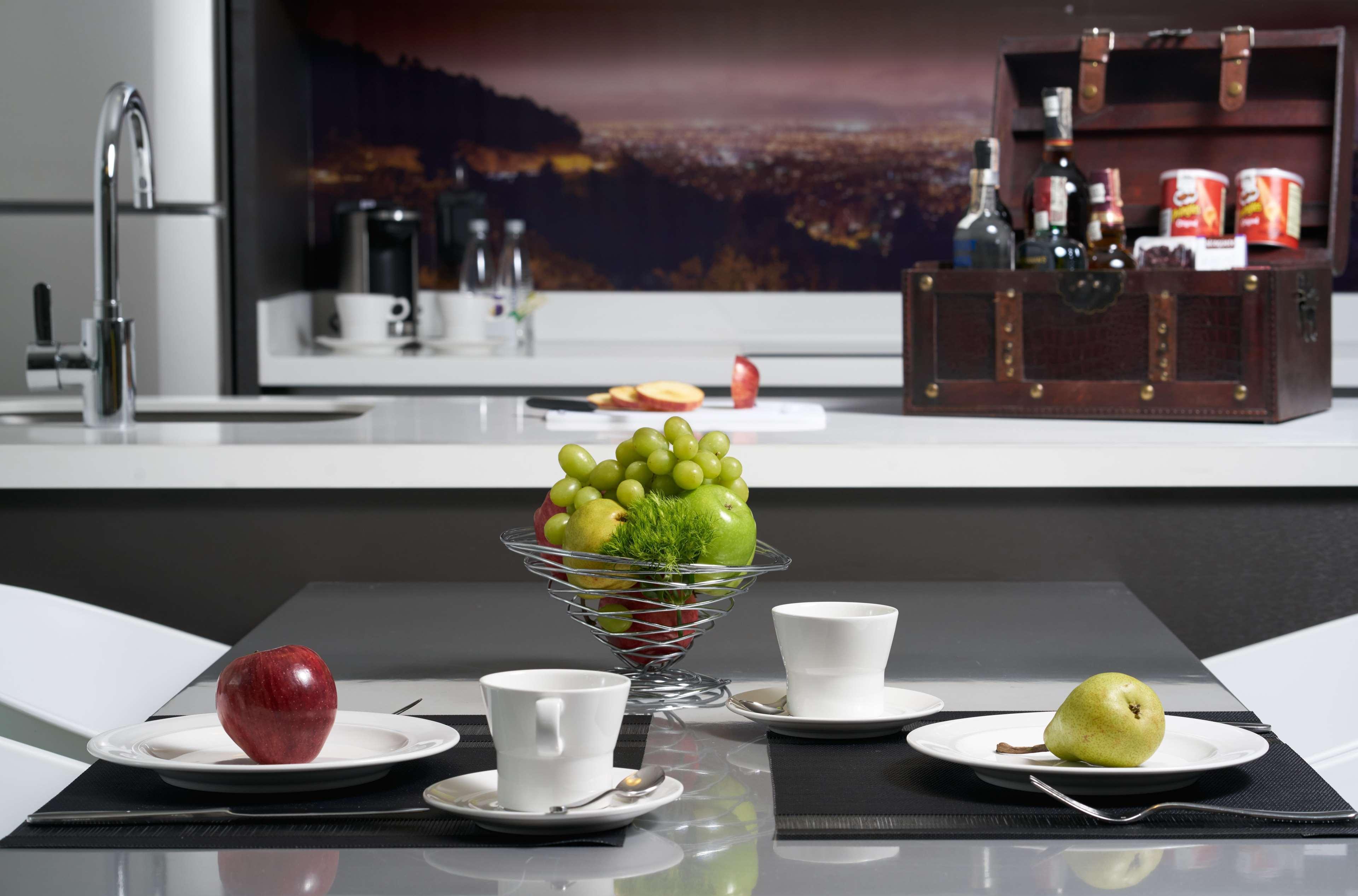 Hotel 100 Luxury Suites By Preferred Bogotá Exterior foto A kitchen with a built-in coffee machine