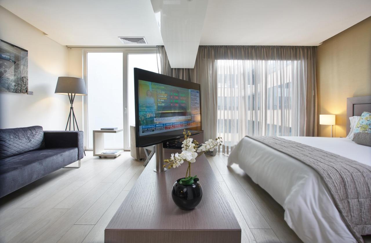 Hotel 100 Luxury Suites By Preferred Bogotá Exterior foto A room at the hotel